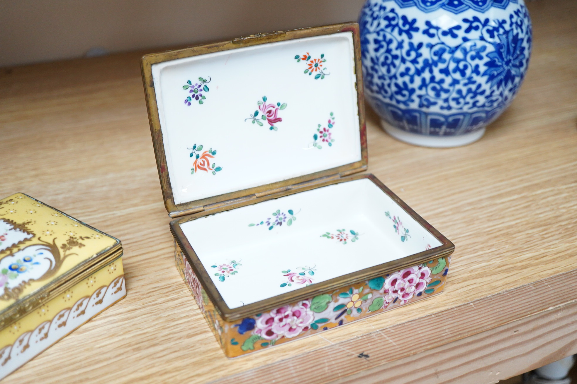 Two rectangular gilt mounted French porcelain trinket boxes, 12cm x8cm